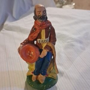 Colorful Ceramic Sculpture with Red and Brown Details